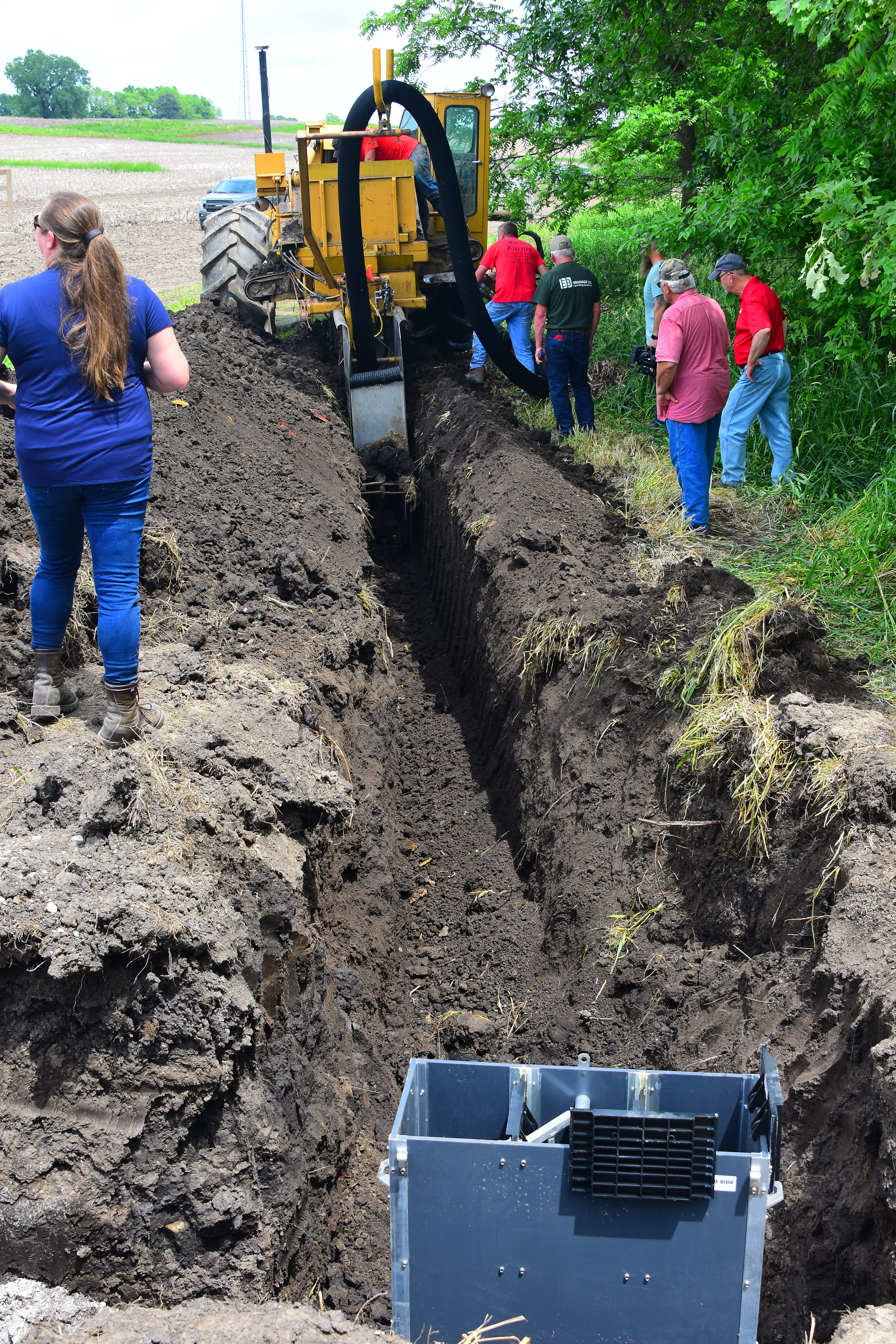 Digging a Saturated Buffer trench at the Fawcett Farm during their field day